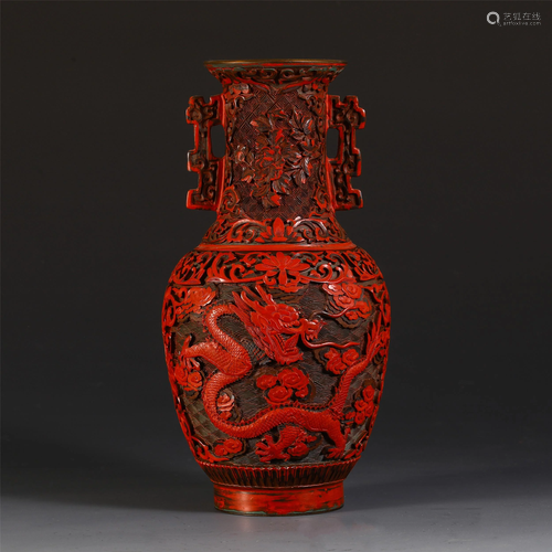 A CHINESE CINNABAR CARVED DRA…