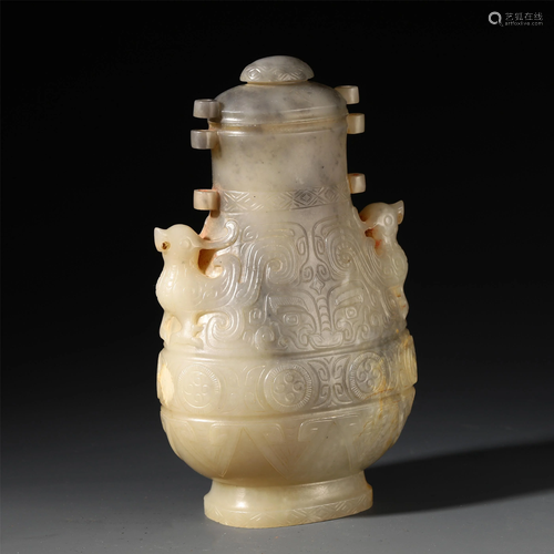 AN ANCIENT CHINESE JADE CARVED B…