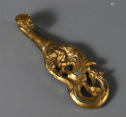 A CHINESE GILT BRONZE CARVED BEAST …