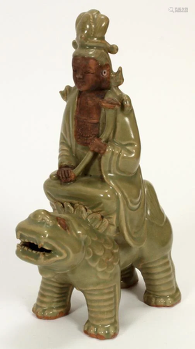 CHINESE CELADON BUDDHA RIDIN…