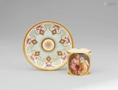 A Vienna porcelain cup and saucer with a painting reproduction after Carlo CignaniOf cylindrical