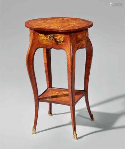 A side table attributed to the studio of the Gebrüder SpindlerPalisander, rosewood, walnut, and