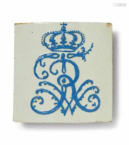 An earthenware stove tile with conjoined monogram of Friedrich Wilhelm I King in PrussiaConvex tile,