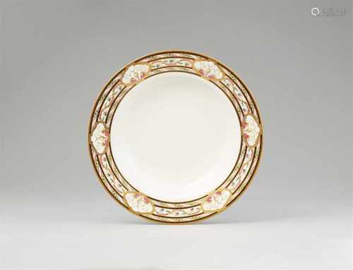 A Vienna porcelain dinner plate with vase decorDeep dish painted with three concentric bands of