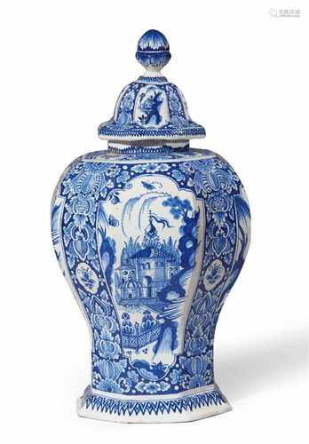 A Berlin faience vase and cover with a Chinoiserie pavillion motifBaluster-form vase of octagonal