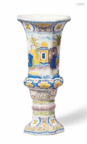 A Berlin faience vase with Chinoiserie decorSlender vases of octagonal section with tall shafts