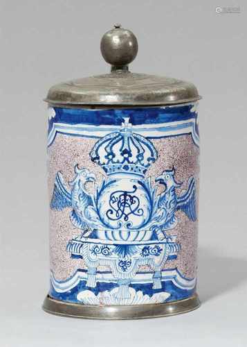 A Berlin faience tankard with the royal monogramDecorated with a large foliate cartouche with the