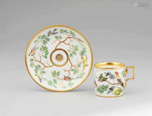 A Vienna porcelain cup and saucer with Continental birdsOf cylindrical form with original saucer.