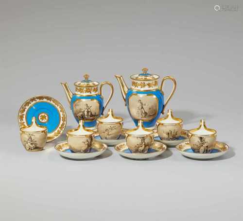 A Vienna porcelain coffee service with allegorical scenesComprising two coffee pots with original