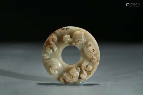 A WHITE AND RUSSET JADE 'CHILONG' BI DISC
