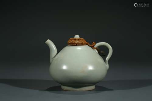 A CHINESE CELADON GLAZED TEAPOT