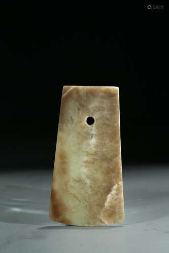 A CELADON JADE CARVED AXE BLADE