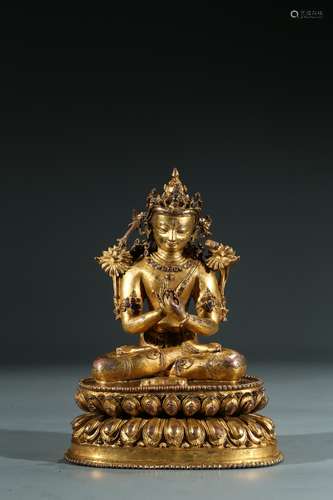 A TIBETAN GILT BRONZE BODHISATTVA WITH INLAYS