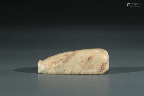 A JADE CARVED RECUMBENT PIG