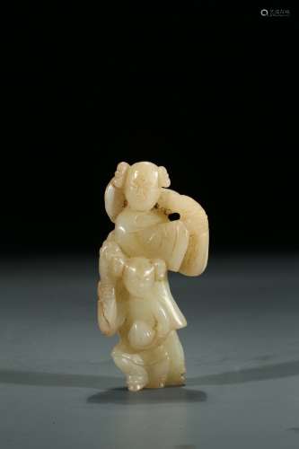 A WHITE JADE CARVING OF FIGURES