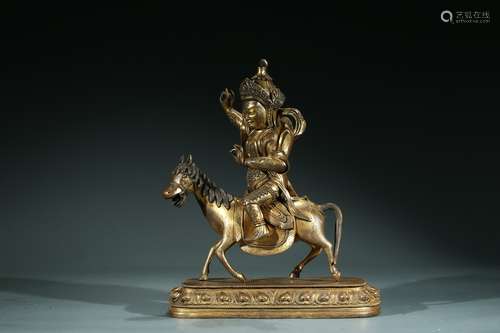 A CHINESE GILT BRONZE FIGURE OF TAOIST DEITY