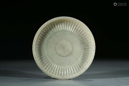 A CHINESE CELADON JADE INSCRIBED CHRYSANTHEMUM DISH