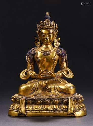 A GILT-BRONZE FIGURE OF AMITAYUS