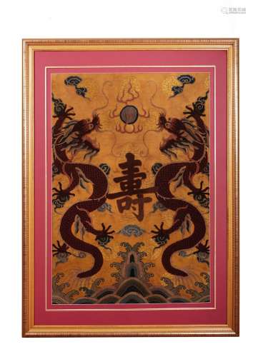 A CHINESE FRAMED EMBROIDERED 'DRAGON AND SHOU' PANEL