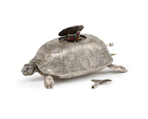 A silver turtle-form singing bird music box