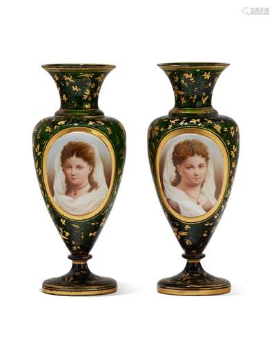 A pair of green Bohemian glass portrait vases