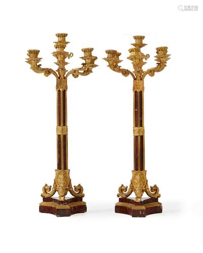 A pair of French gilt-bronze and rouge marble