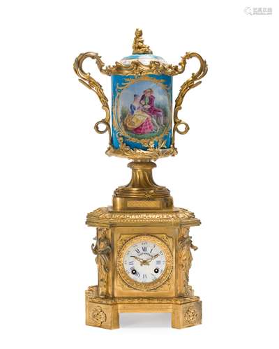 A gilt-bronze and porcelain table clock