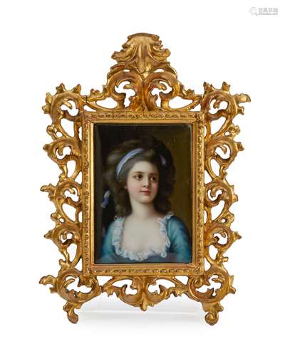 A framed painted porcelain portrait plaque