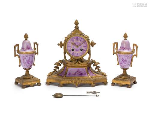 A French gilt-bronze and painted porcelain clock and