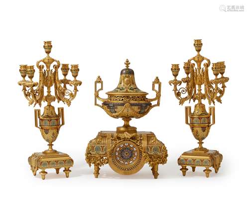 A gilt-bronze and champleve clock and garniture set