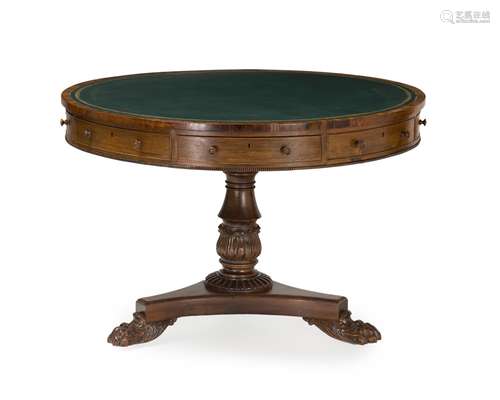 An English Regency drum table with leather top