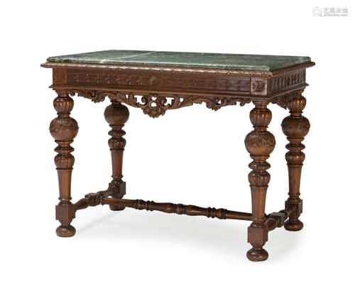 A French carved walnut library table