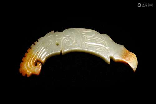 A JADE CARVED 'DRAGON' HUANG PENDANT