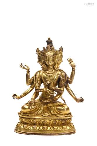 A TIBETAN GILT BRONZE FIGURE OF USNISA VIJAYA