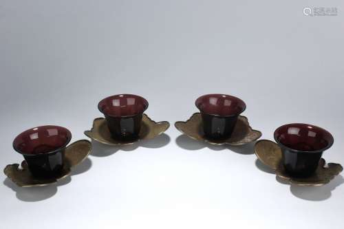 A SET OF PEKING GLASS CUPS WITH SILVER STANDS