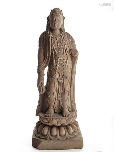 A STONE CARVING OF STANDING BODHISATTVA