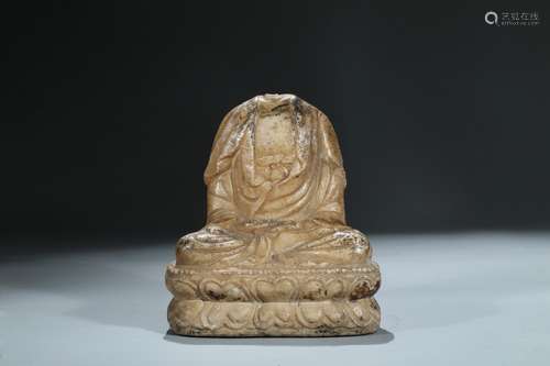 A MARBLE CARVED FIGURE OF AMITABHA TORSO