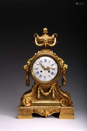 A LOUIS XVI STYLE GILT BRONZE MANTLE CLOCK