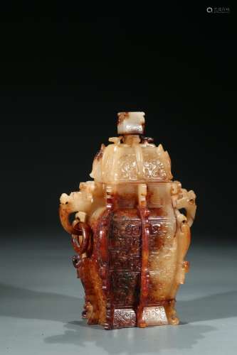 A JADE CARVED VASE AND COVER