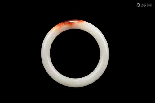 A CARNELIAN JADE BANGLE