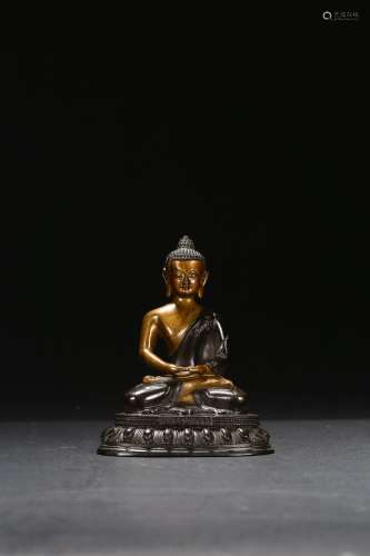 A BRONZE FIGURE OF AMITABHA