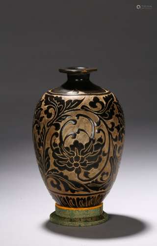 A CARVED DARK BROWN GLAZED VASE