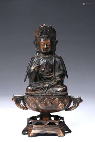 A BRONZE PARCEL GILT FIGURE OF GUANYIN