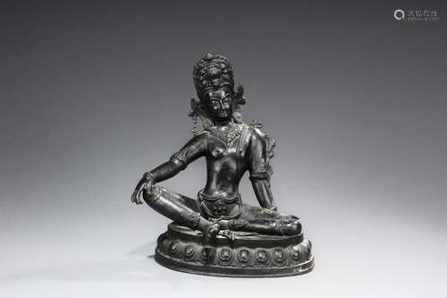 A BRONZE FIGURE OF SEATED TARA