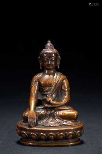 A SMALL BRONZE FIGURE OF SEATED SHAKYAMUNI