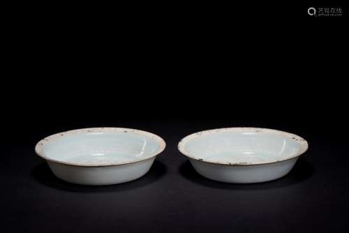 A PAIR OF CELADON GLAZED DISHES