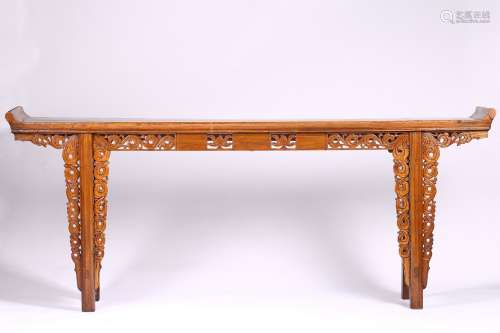 A WOOD ALTAR TABLE