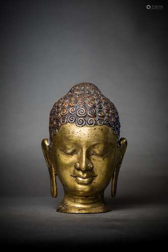 A GILT BRONZE BUDDHA HEAD