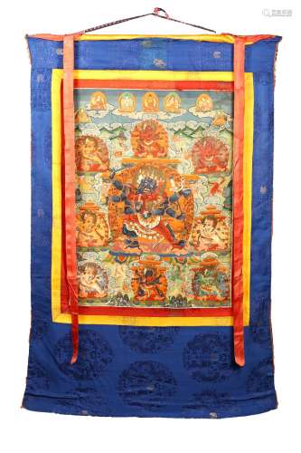 A TIBETAN THANGKA DEPICTING DEITY