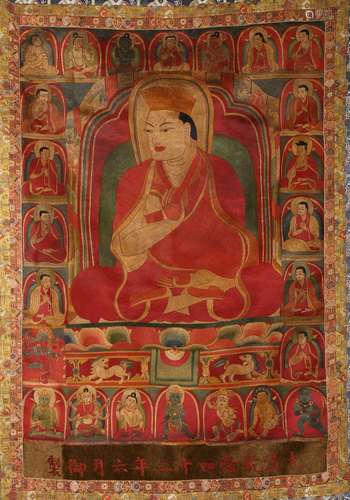 AN EMBROIDERED 'LAMA' THANGKA HANGING SCROLL